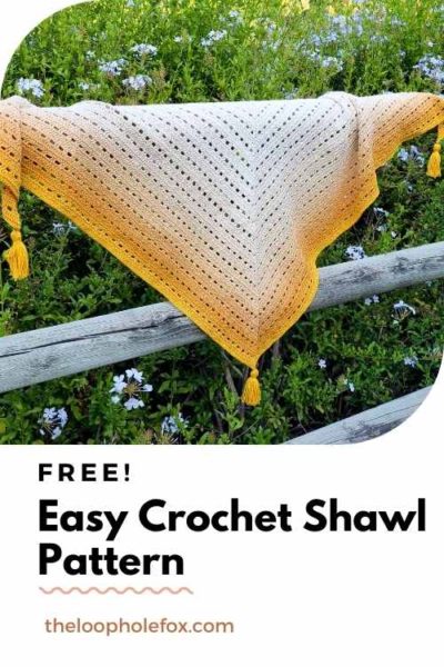 This image is a pinterest pin for this crochet triangle shawl pattern. The pinterest pin shows an image of the shawl and reads "Easy Crochet Shawl Pattern".