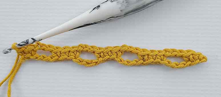 This image shows the finished first row of the stitch.
