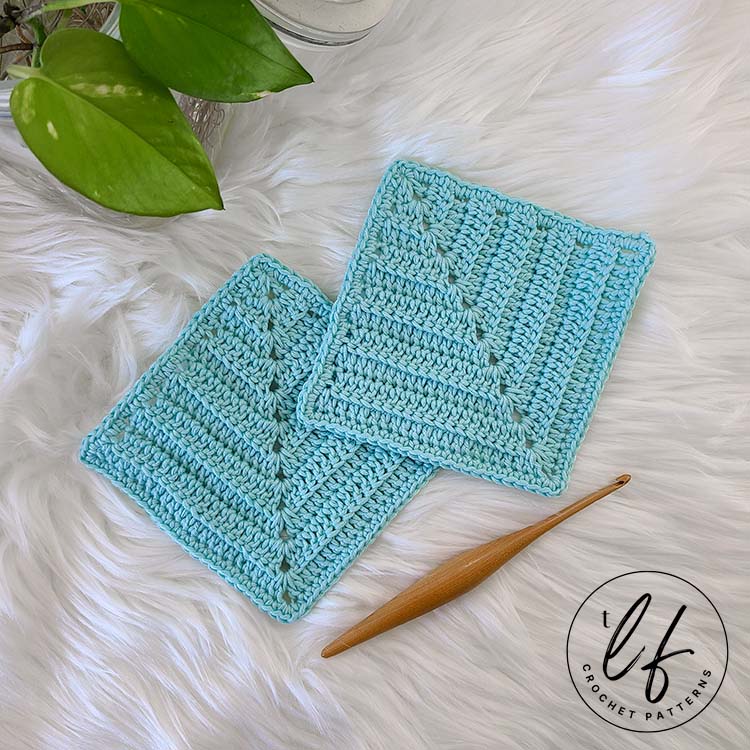 This image shows a pair of crochet bonding squares laid flat on a fluffy white background. They are slightly overlapping.