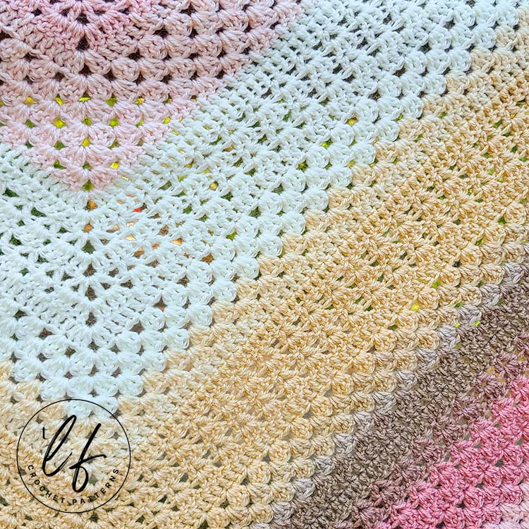 This image is a close up of the stitches used in this granny triangle shawl. You can see the granny stitch and the V stitches in closer detail.