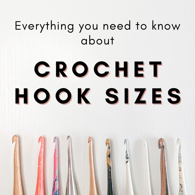 This image is a header image for the blog post. It reads "Everything you need to know about Crochet Hook Sizes". The photo shows crochet hooks lined up at the bottom and is taken on a white background.